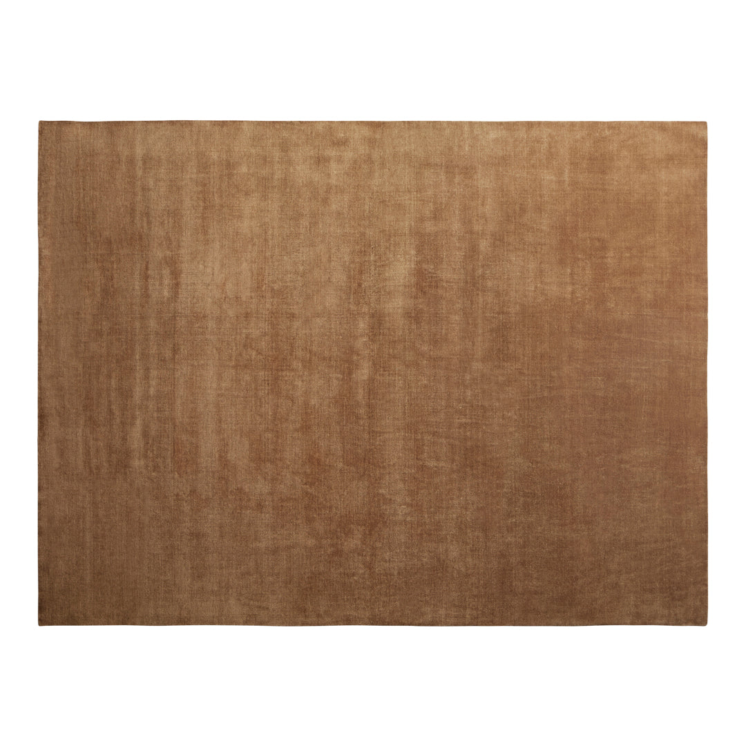 Solid brown area rug with a soft texture, adding warmth and elegance to any space. Perfect for modern or rustic decor.