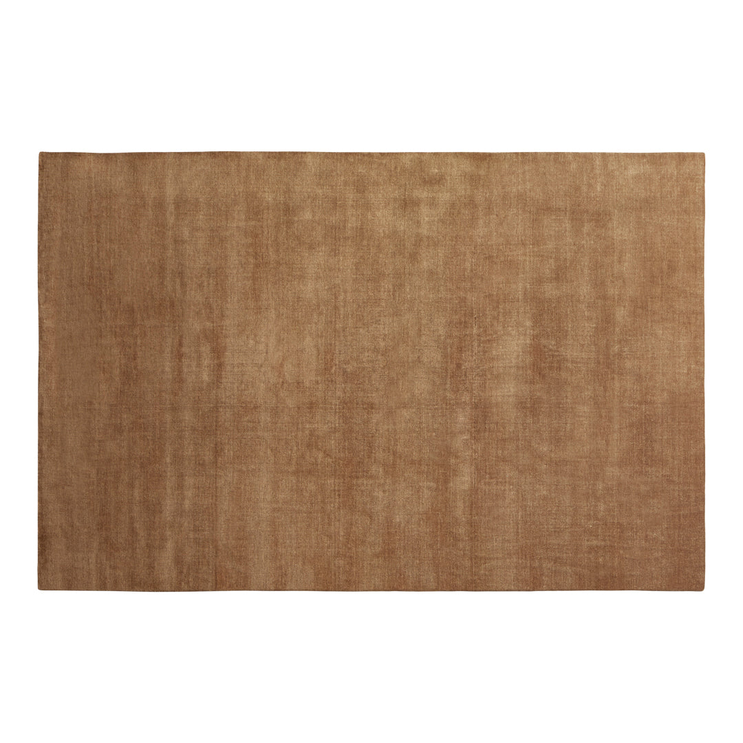 Solid brown area rug with a subtle textured pattern, perfect for warm, earthy decor.