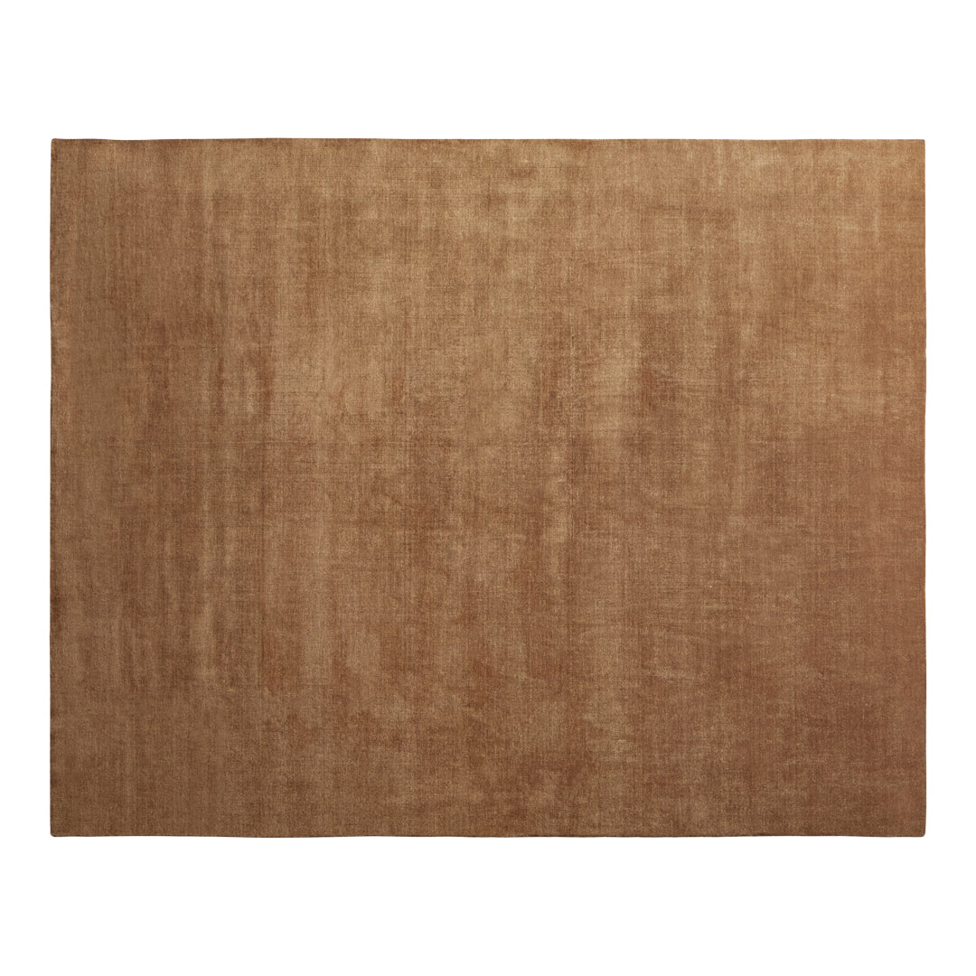 Soft brown textured area rug with a smooth, solid surface, ideal for warming up any living space.