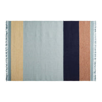 Multicolored woven blanket featuring stripes in light blue, navy, beige, and rust with fringed edges.