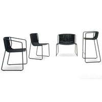 Black woven chairs with sleek metal frames, showcasing a modern minimalist design and varied seating heights.