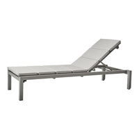 Gray aluminum chaise lounge with a sleek, modern design and subtle textured fabric cushions. Perfect for outdoor relaxation.