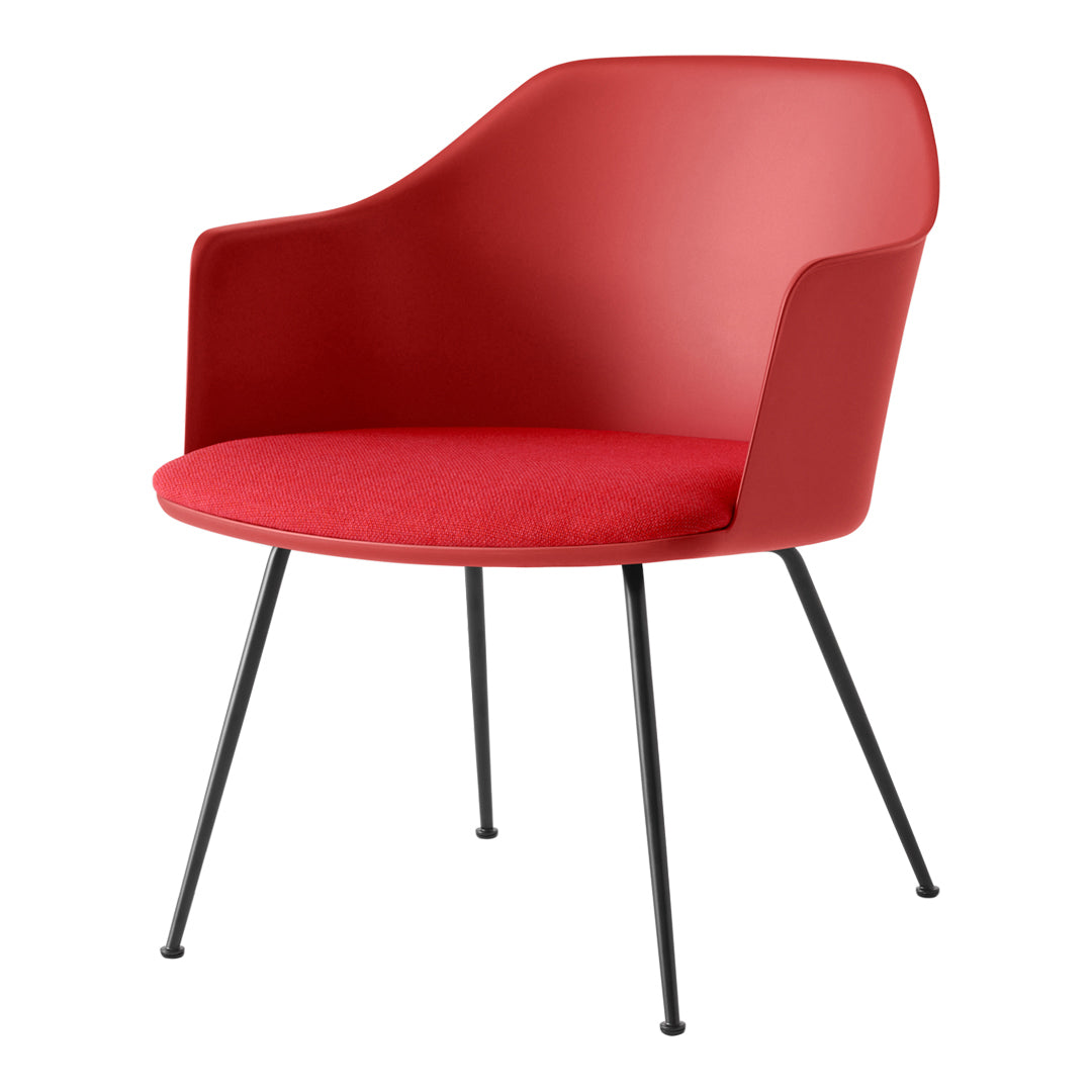 Red upholstered chair with black metal legs and a modern, minimalist design. Ideal for stylish interiors.