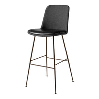 Black upholstered bar stool with a sleek design and bronze metal legs, perfect for modern interiors.