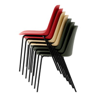 Colorful stacked chairs in red, beige, green, and black with smooth, modern designs and sleek legs.