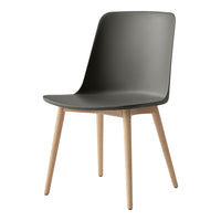 Modern gray chair with a sleek design and natural wood legs, perfect for minimalist decor.