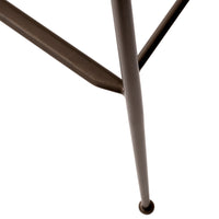Brown metal table leg with a sleek, modern design and minimalist aesthetic.