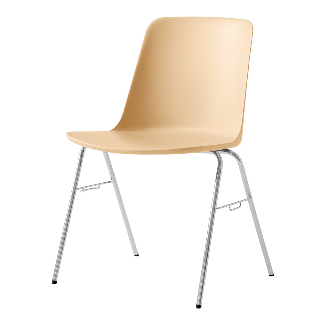 Beige plastic chair with a smooth finish and sleek chrome legs, perfect for modern, minimalist decor.