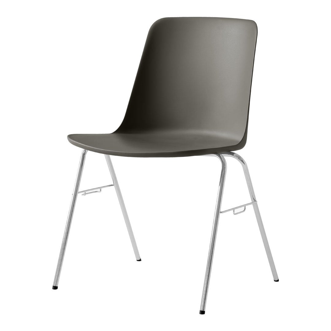 Gray plastic chair with a smooth finish and sleek silver metal legs. Minimalist design for modern decor.