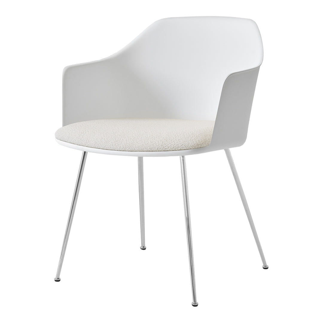 White chair with smooth, modern design and a neutral beige cushion, featuring sleek metallic legs. Perfect for minimalistic decor.