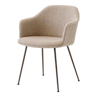 Beige textured chair with soft, fluffy fabric and sleek black metal legs. Perfect for modern home decor.
