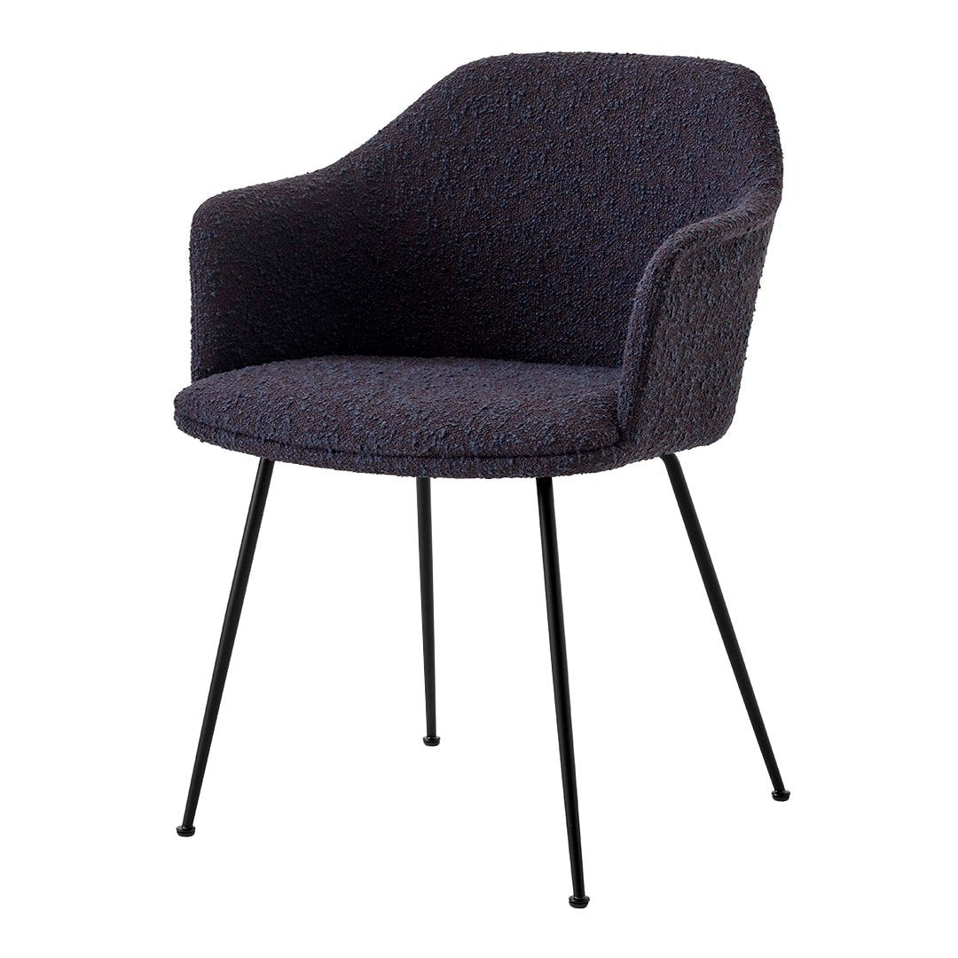 Stylish chair in a textured dark navy upholstery with black metal legs, perfect for modern decor.
