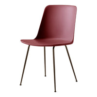 Modern burgundy chair with sleek, minimalist design and contrasting black metal legs. Perfect for contemporary decor.