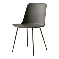 Modern gray chair with sleek lines and minimalist design, featuring a matte finish and slender black legs.