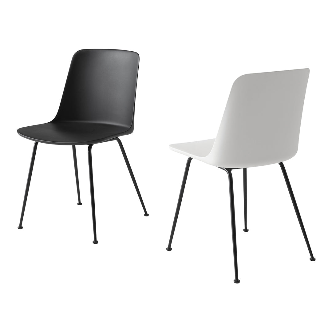 Black and white modern chairs with sleek, minimalistic design and sturdy black legs. Perfect for contemporary spaces.