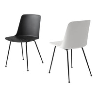Black and white modern chairs with sleek, minimalistic design and sturdy black legs. Perfect for contemporary spaces.