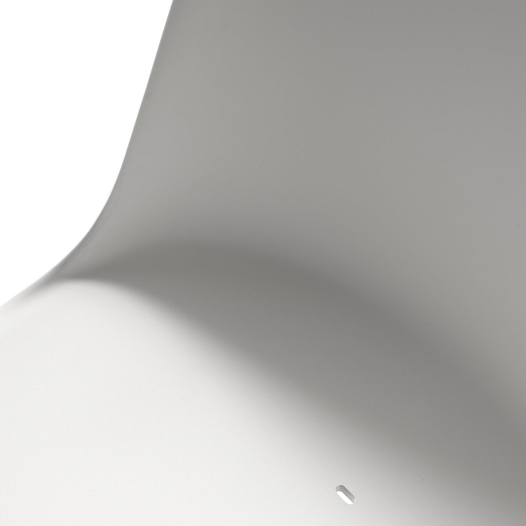 Sleek, smooth surface in matte white with subtle curvature, showcasing minimalist design and modern elegance.