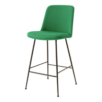 Modern green upholstered bar stool with sleek black metal legs, perfect for contemporary decor.