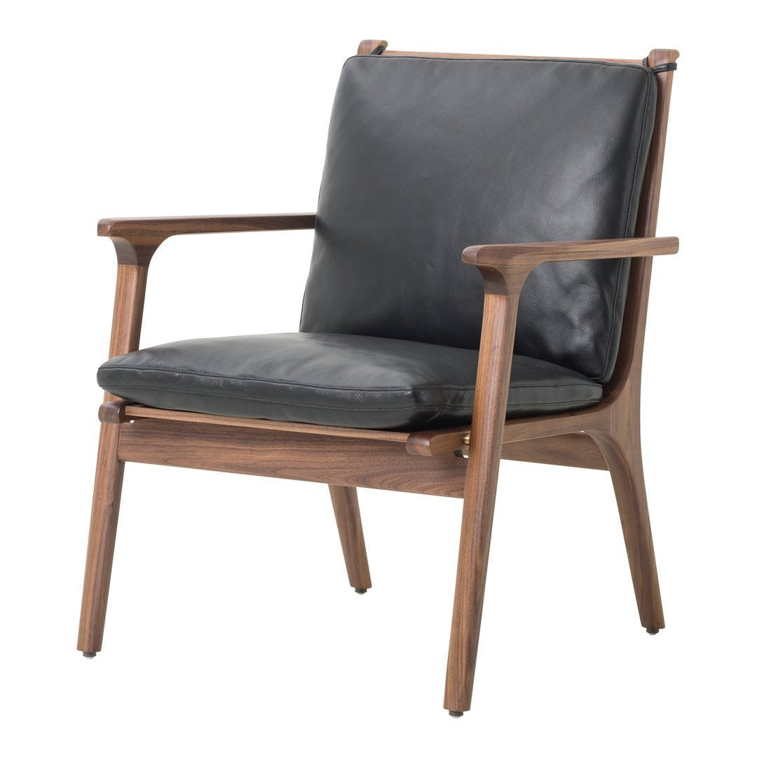 Black leather armchair with a sleek walnut wood frame, perfect blend of modern design and natural tones.