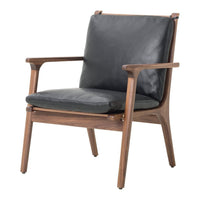Black leather armchair with a sleek walnut wood frame, perfect blend of modern design and natural tones.