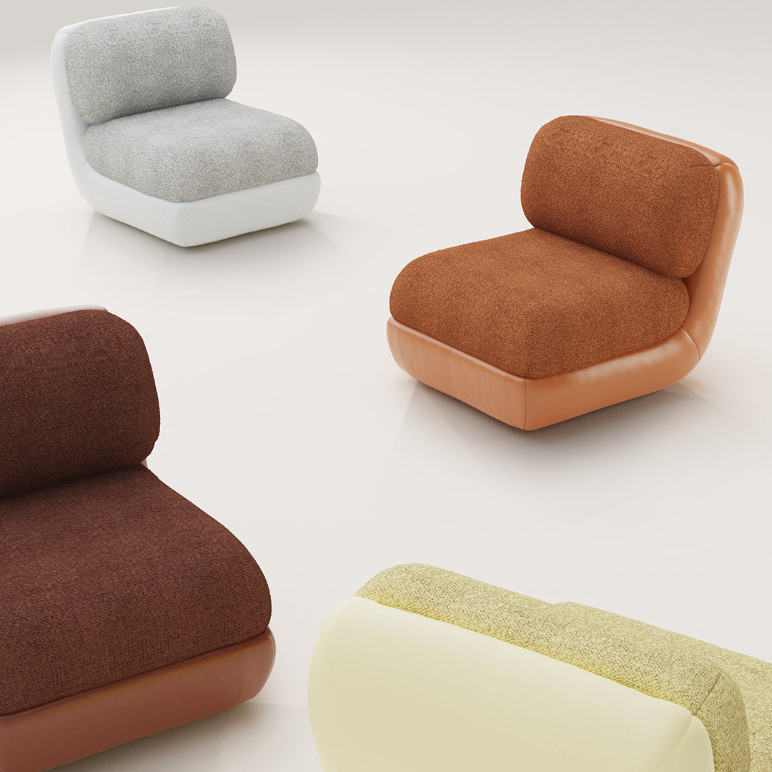 Colorful modern chairs in gray, white, brown, orange, and light yellow fabric with varied textures and patterns.