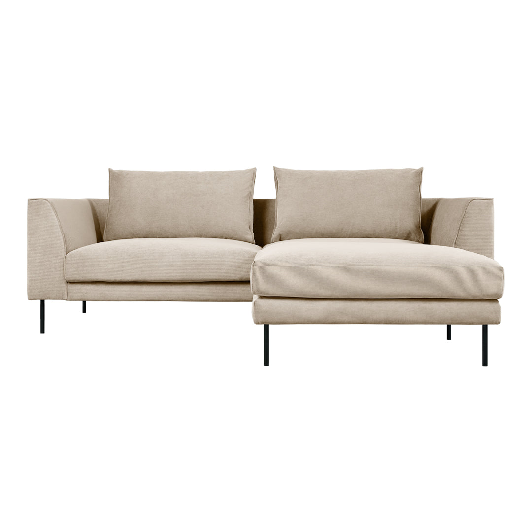 Beige sectional sofa with plush cushions and sleek black legs, featuring a minimalist design and soft fabric texture.