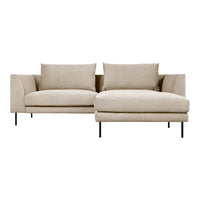 Beige sectional sofa with plush cushions and sleek black legs, featuring a minimalist design and soft fabric texture.