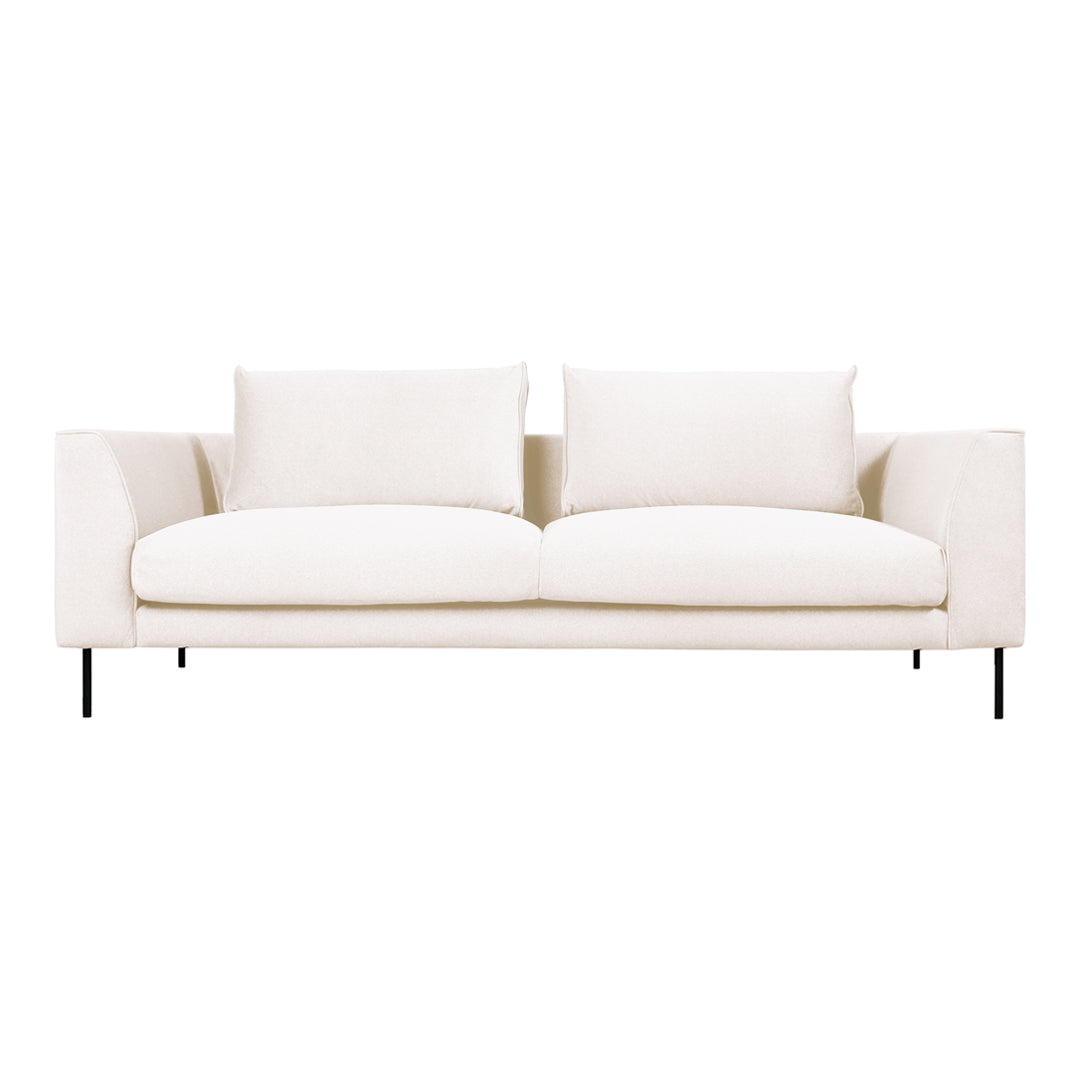 Elegant beige sofa with soft, textured upholstery and minimalist design, featuring clean lines and neutral colors.