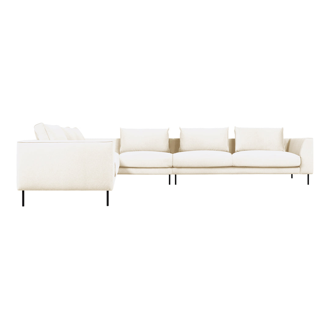 Modern, cream-colored sectional sofa with clean lines and plush cushions, featuring a minimalist design on metal legs.