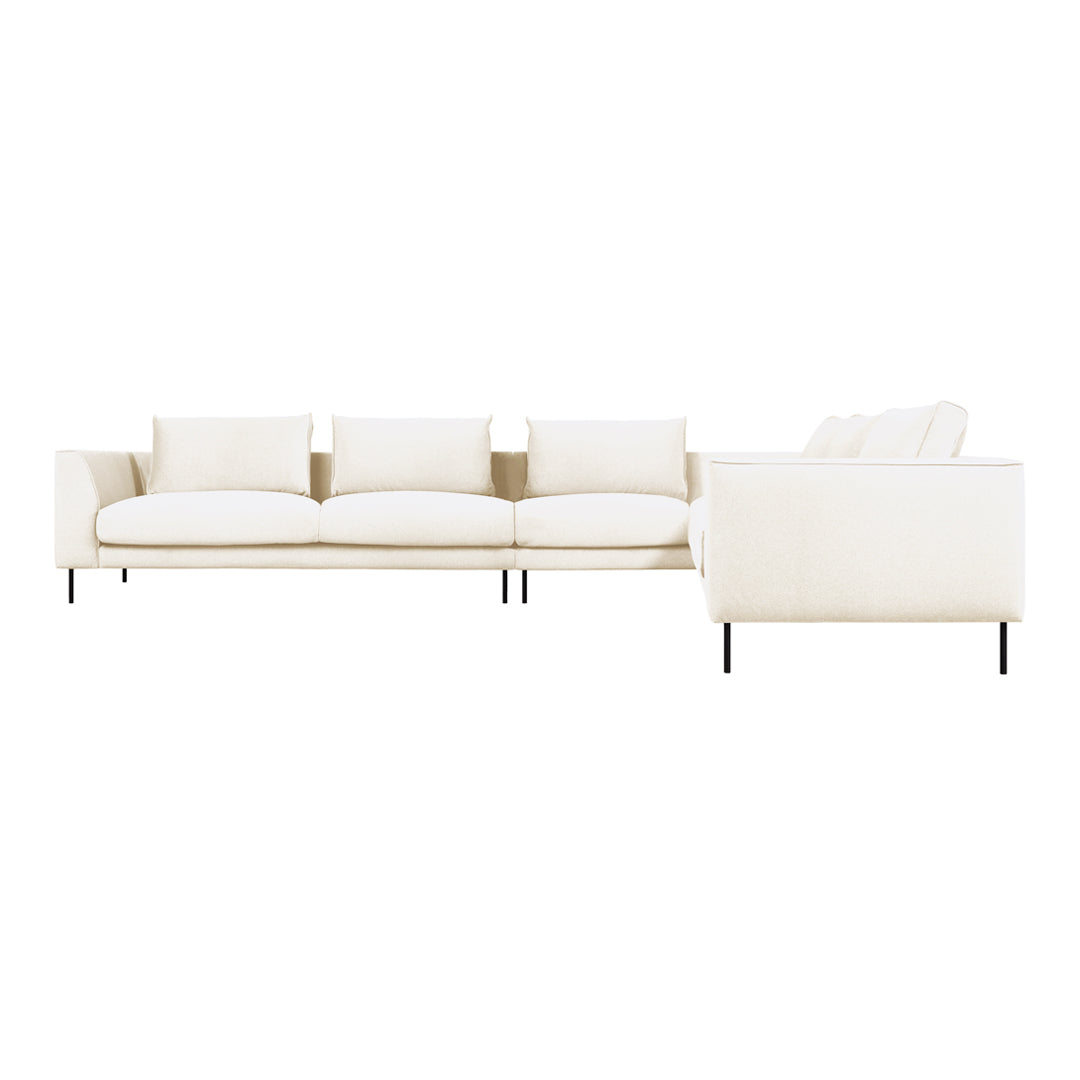 Cream-colored sectional sofa with a smooth fabric surface and minimalist design, featuring plush cushions and metal legs.