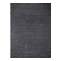 Solid charcoal gray area rug with a smooth, textured surface, perfect for modern decor.