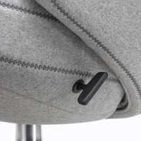 Gray upholstered chair with contrasting black stitching and lever, featuring a modern, sleek design.
