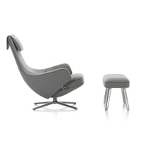 Gray upholstered lounge chair with matching ottoman, featuring a sleek design and minimalist patterns.