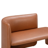 Tan leather sofa with a sleek, minimalist design and smooth, curved edges. Perfect for modern interiors.