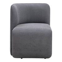 Modern gray upholstered accent chair with a smooth, minimalist design and rounded edges. Ideal for contemporary decor.