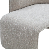 Soft beige fabric with subtle speckled pattern, perfect for modern furniture aesthetics.