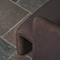Dark brown textured upholstery with a modern, sleek design. Perfect for contemporary interiors.