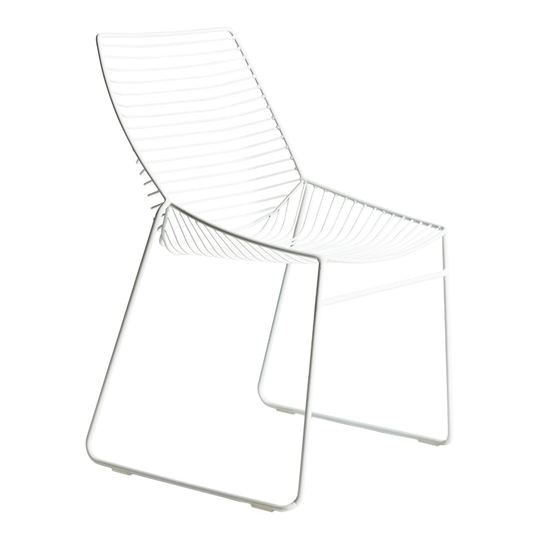 White wire chair with sleek lines and a minimalistic design, perfect for modern decor.