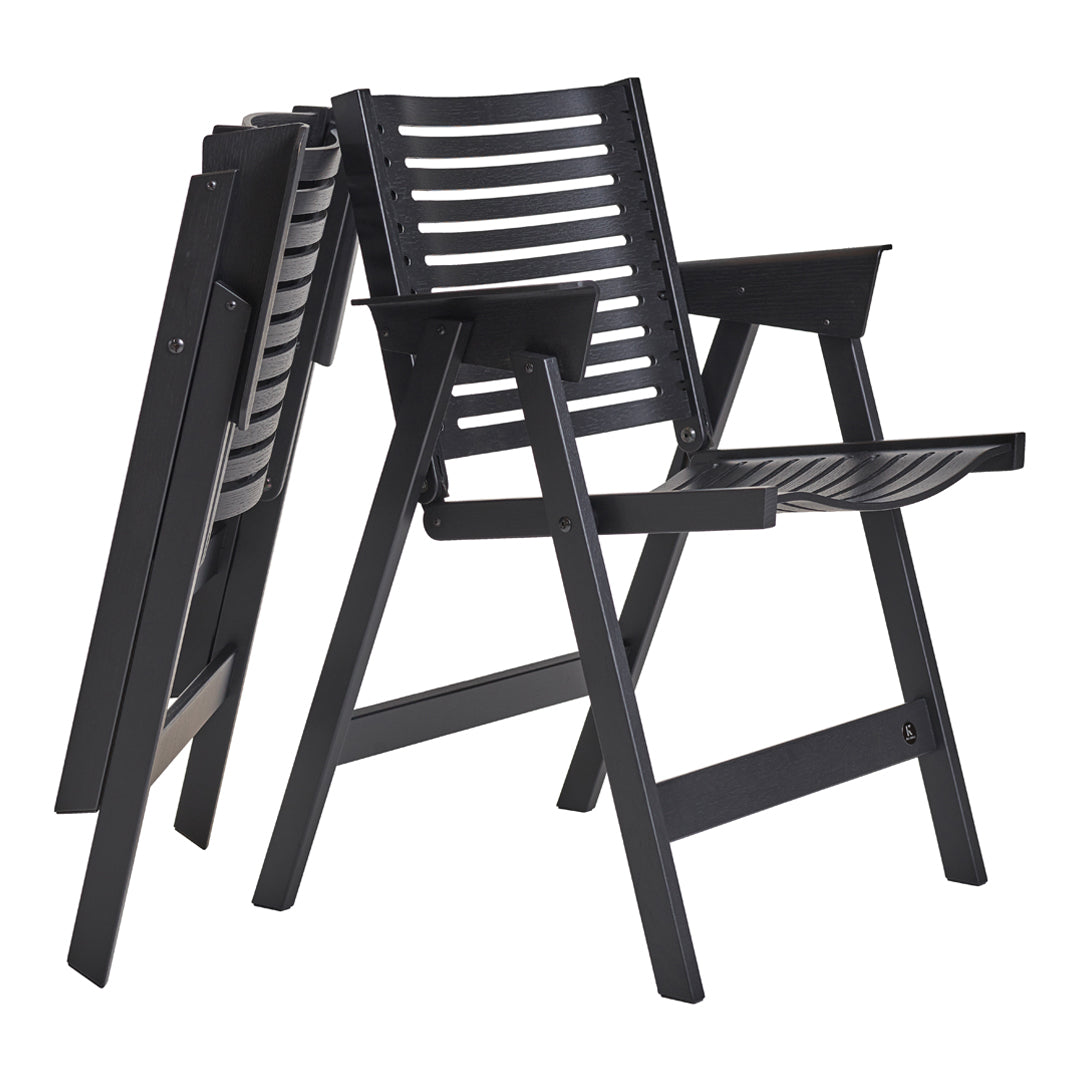Black slatted outdoor chairs, featuring a modern minimalist design and a sleek foldable style. Perfect for patios.