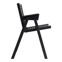 Side view of a sleek black chair with a minimalist design and geometric patterns. Ideal for modern decor.