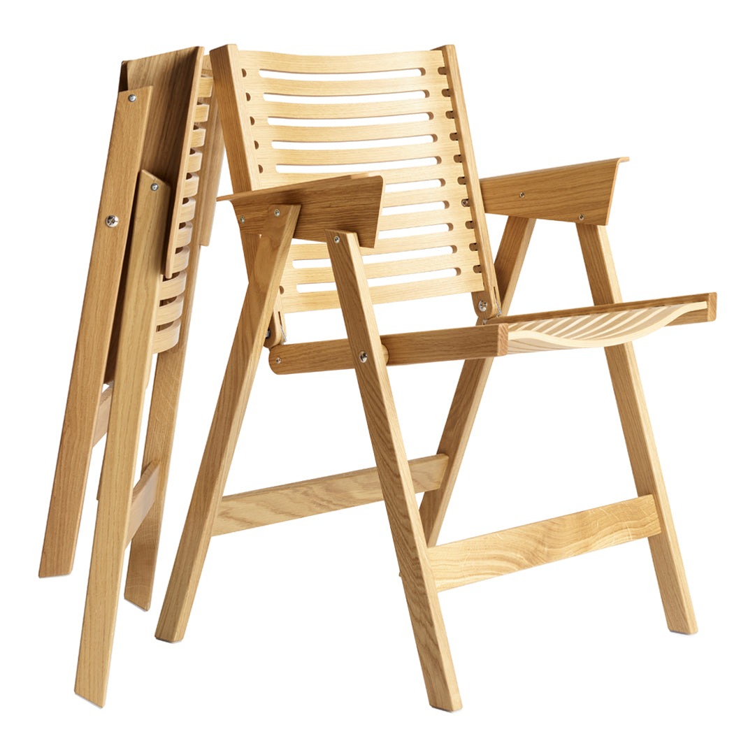 Light natural wood folding chair with slatted pattern, showcasing a smooth finish and contemporary design.