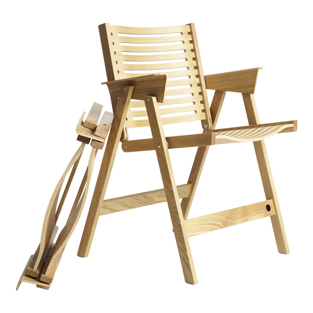 Light wood chair with a slatted pattern, featuring natural tones and a simple, elegant design.