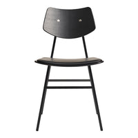 Black minimalist chair with a smooth wooden seat and back, featuring a sleek, modern design and simple lines.