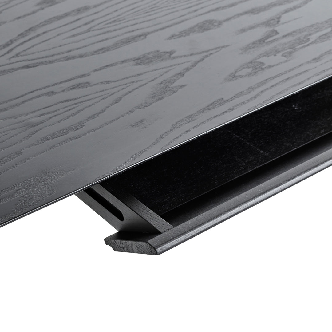 Black wood grain texture with a matte finish, highlighting a sleek design and subtle, modern patterns.
