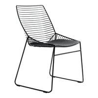 Black wire chair with a minimalist striped design and a sleek, modern silhouette. Perfect for contemporary spaces.