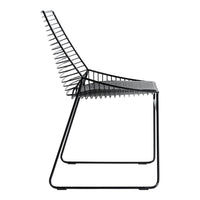 Black chair with a sleek, geometric design featuring vertical slats and a minimalist frame.
