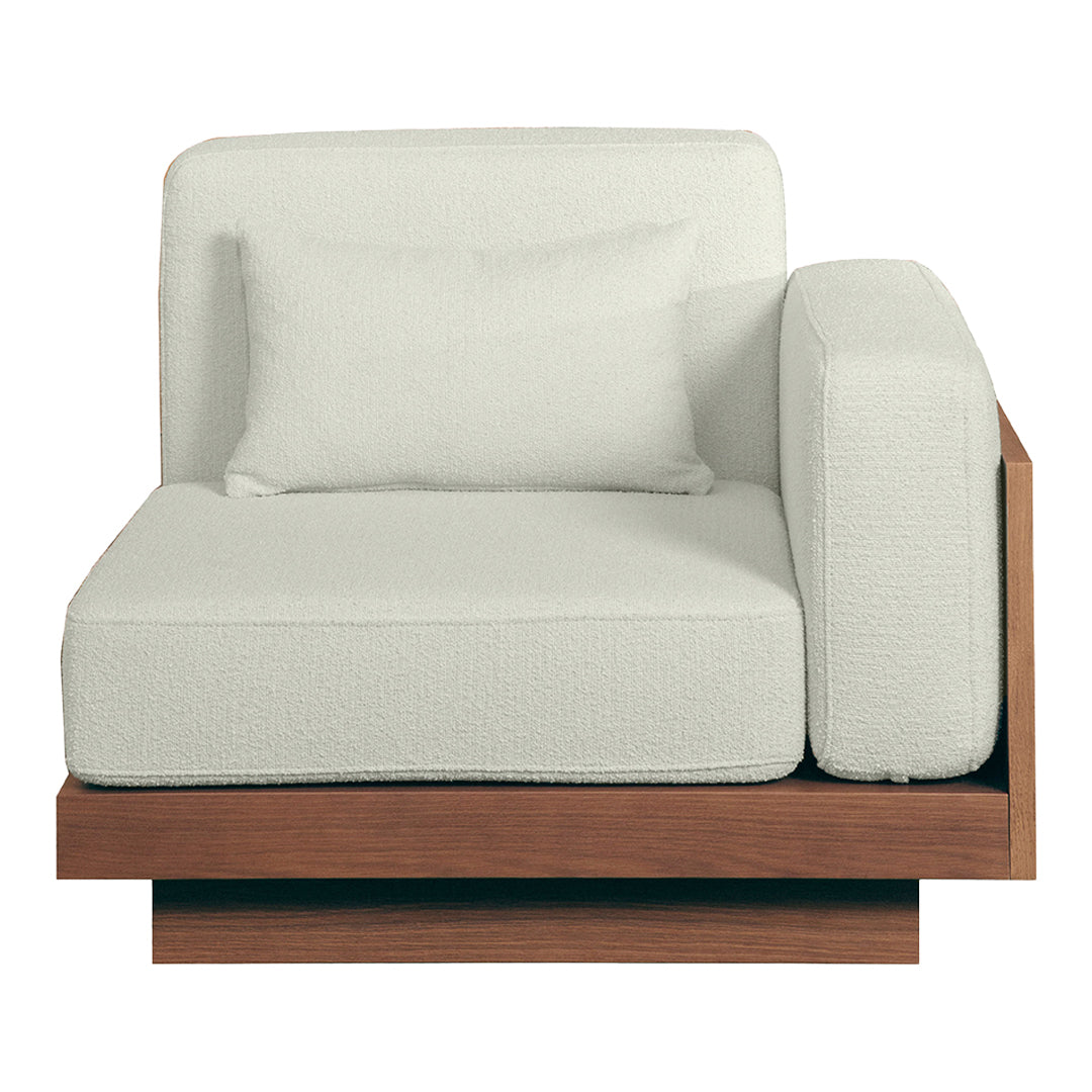 Modern beige armchair with a wooden base and a textured fabric cushion, featuring a minimalist design.