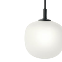 White spherical pendant light with a sleek black hanging cord, featuring a smooth, minimalist design.