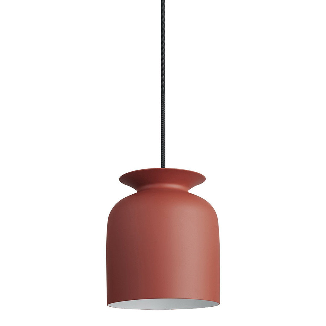 Modern red pendant lamp with a matte finish and a sleek, curved design. Perfect for contemporary decor.