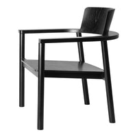 Black wooden armchair with a sleek design and subtle grain pattern, featuring an integrated shelf.